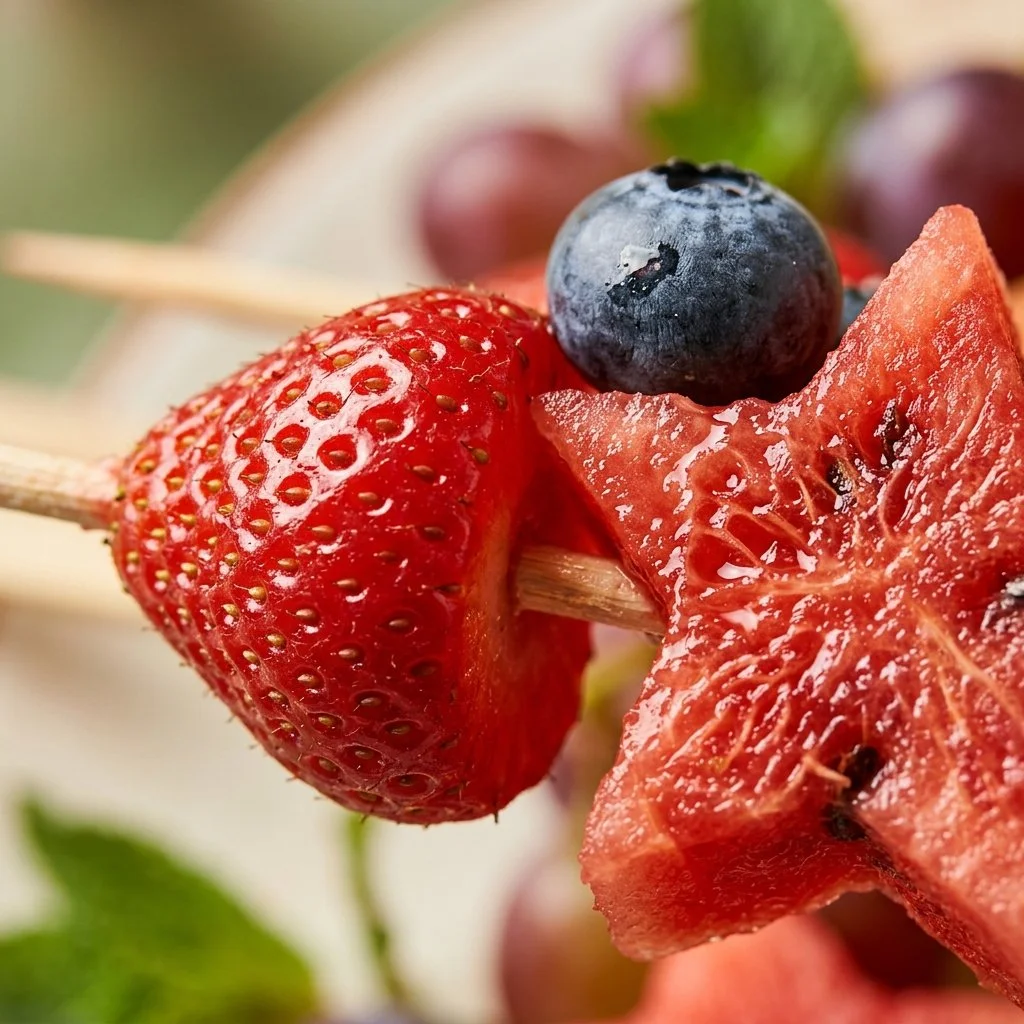 Colorful fruit kabob with watermelon stars for a summer party.