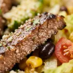 Healthy carne asada steak taco bowl with fresh ingredients and vibrant colors